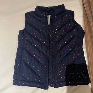 Essentially brand new puffer vest! Great quality. Metallic rainbow dots.